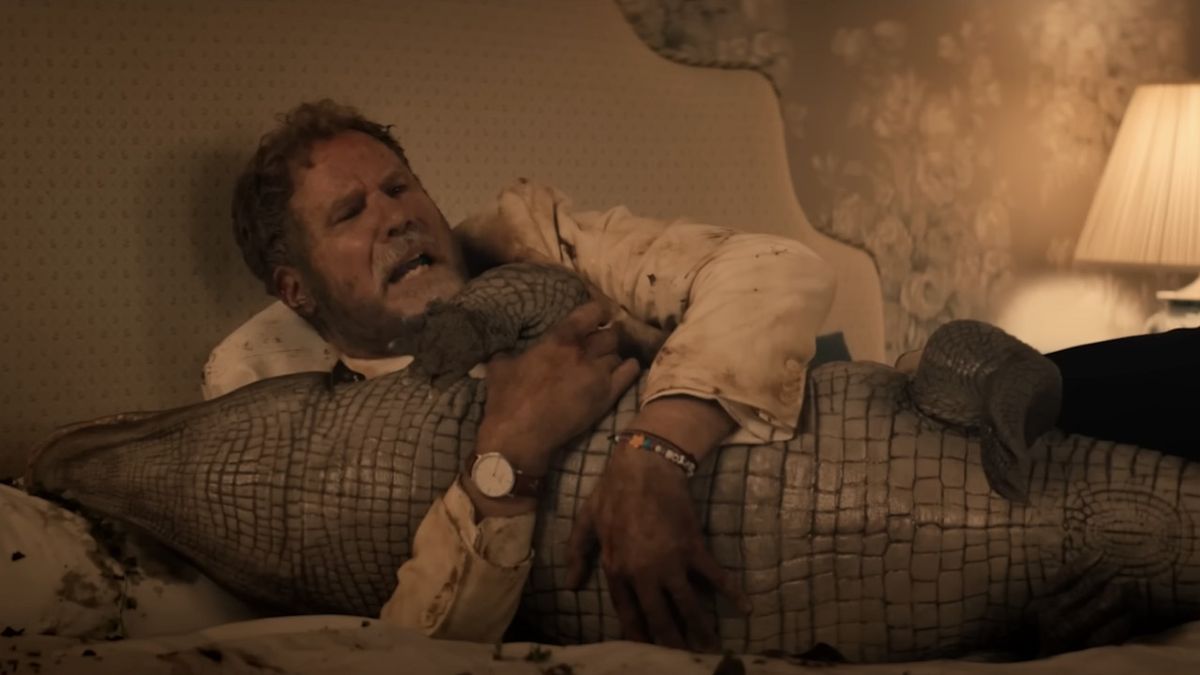 Jim (Will Ferrell) cradles an alligator on You&#039;re Cordially Invited