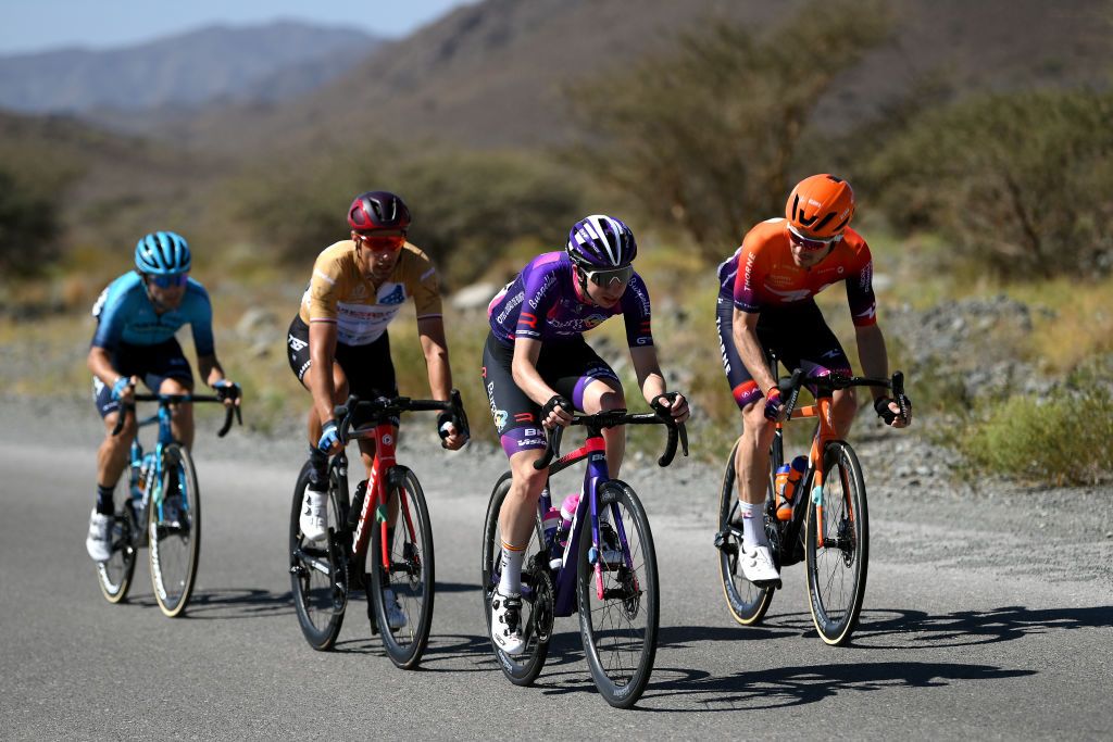 YITTI HILLS OMAN FEBRUARY 14 LR Manuele Boaro of Italy and Astana Qazaqstan Team Jeroen Meijers of The Netherlands and Terengganu Polygon Cycling Team Gold Most Active Rider Alejandro Franco Gonzalez of Spain and Team BurgosBH and Benjamin Perry of Canada and Team Human Powered Health compete in the breakaway during the 12th Tour of Oman 2023 Stage 4 a 2049km stage from Izki to Yitti Hills 147m TourofOman on February 14 2023 in Yitti Hills Oman Photo by Alex BroadwayGetty Images