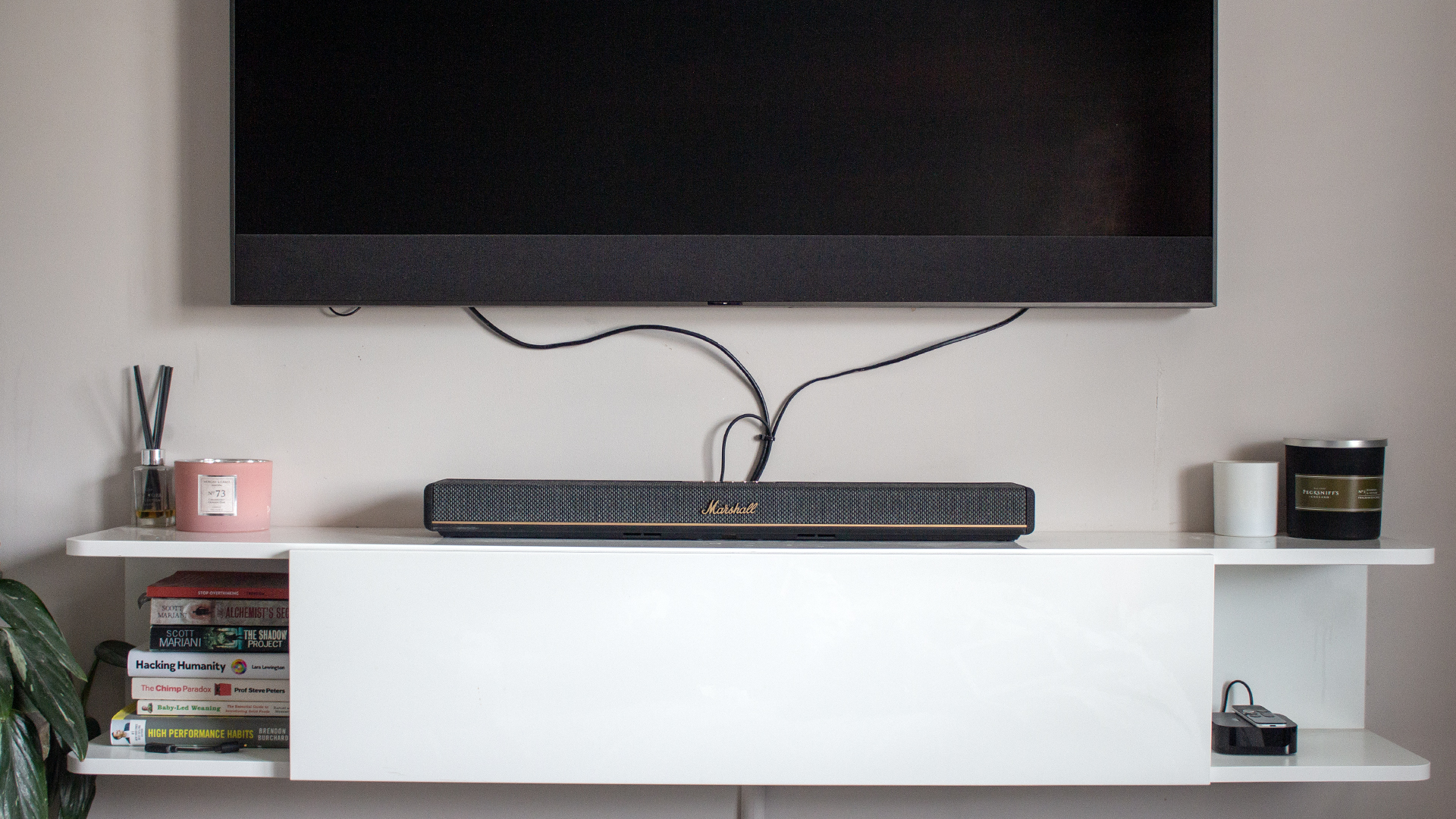 an image of marshall's heston 60 soundbar in a simple white room