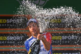 Thibaut Pinot sprays the victor's champagne at Il Lombardia