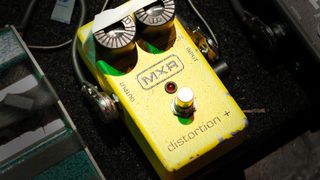 MXR Distortion Plus on a pedalboard