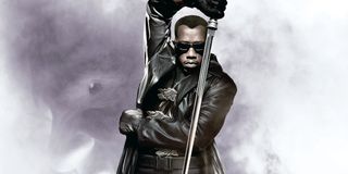 Wesley Snipes as Blade holding sword