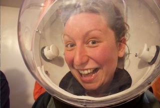 Mel McHugh, senior Raman spectroscopy specialist from the UK rover trials, happy in one of our Mars 160 Lexan helmets.