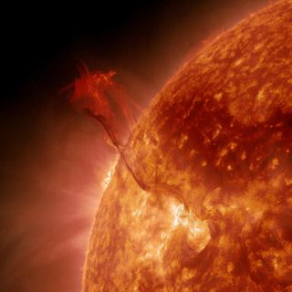 A huge filament of super-hot plasma, nicknamed the "Dragon Tail," erupts from the sun on Jan. 31, 2013, in this still image from NASA's Solar Dynamics Observatory.