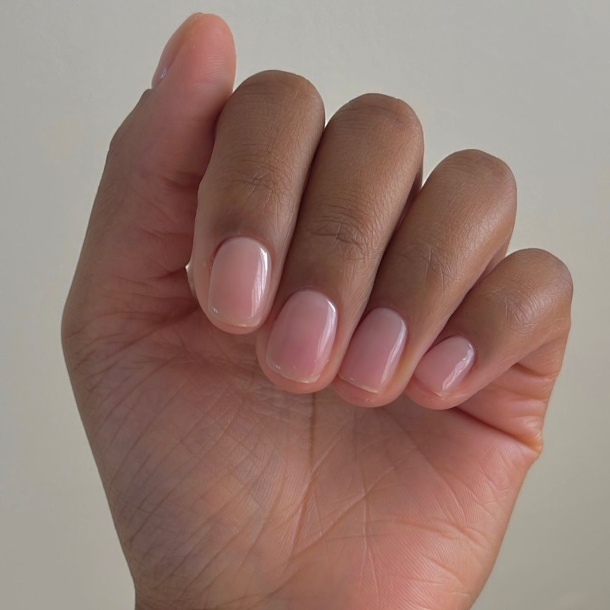 A close up of a natural looking manicure