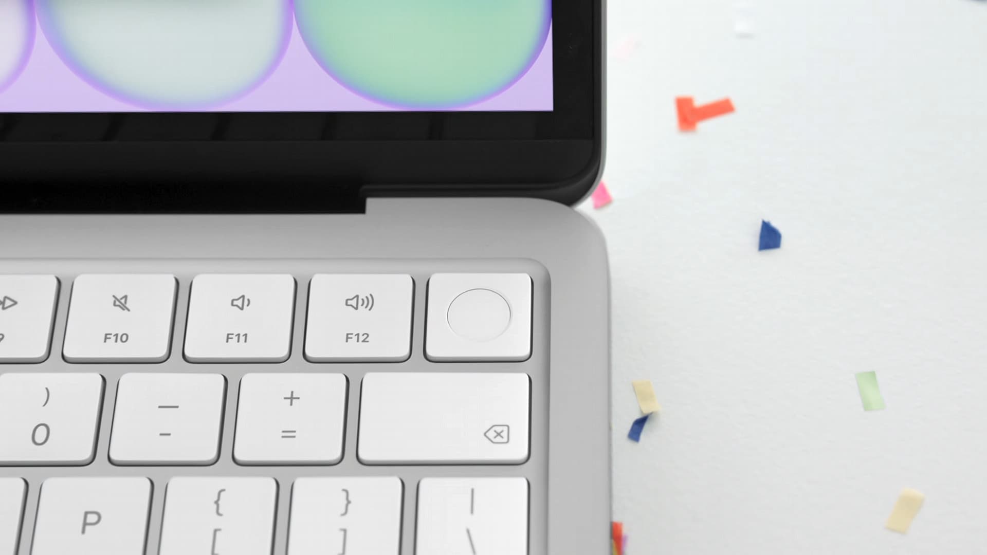 The Touch ID button on the keyboard of the Apple MacBook Neo.