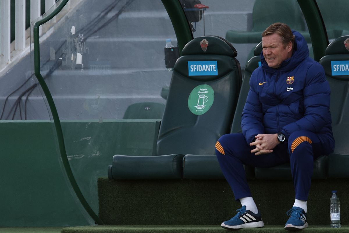 Ronald Koeman head coach of Barcelona sitting on the bench during the La Liga Santander match between Elche CF and FC Barcelona at Estadio Martinez Valero on January 24, 2021 in Elche, Spain.