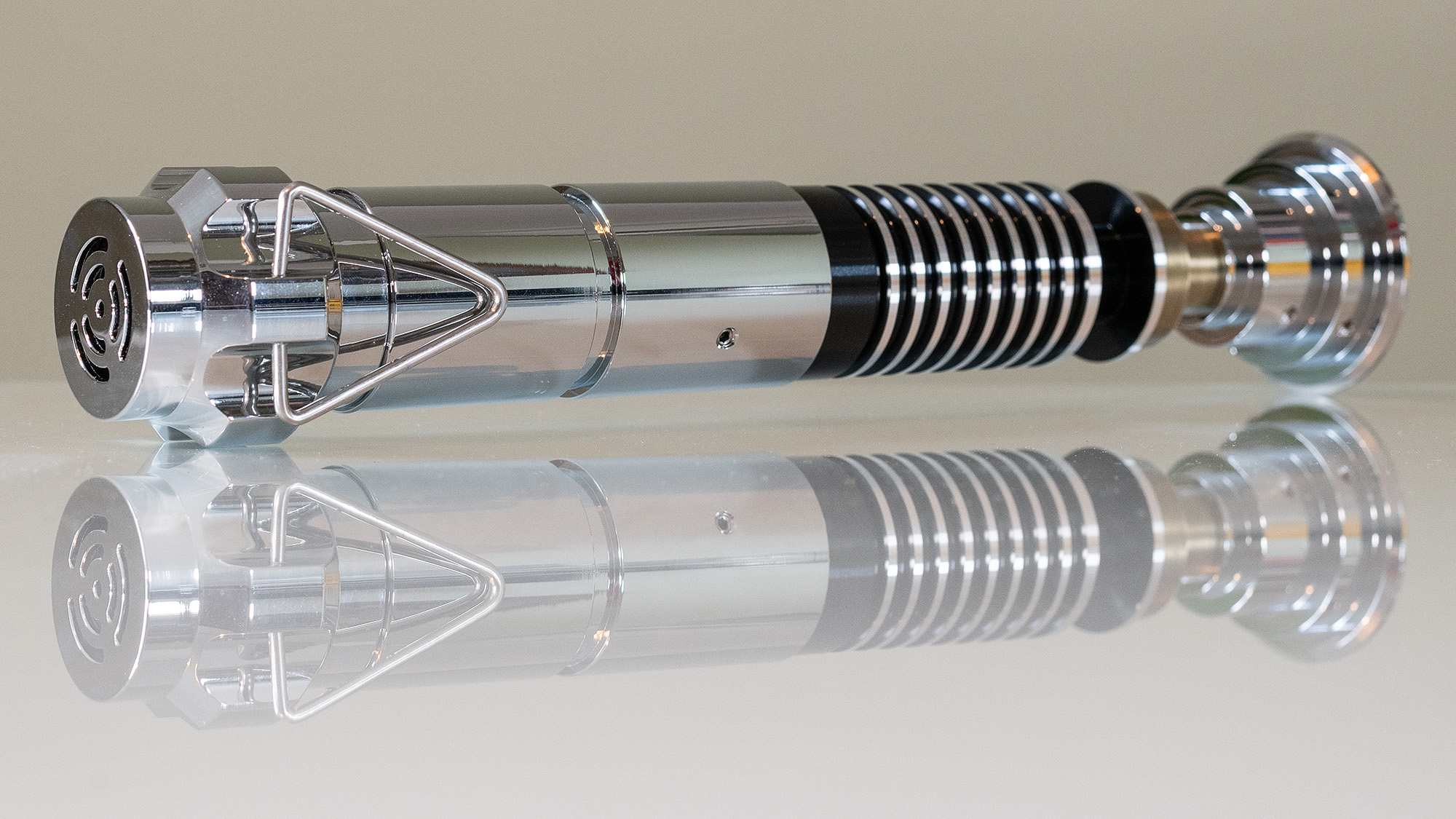 The SabersPro Luke lightsaber hilt, rear view shows the D-ring that can be hooked onto a belt. 