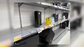 A picture of Sofmap's store, with a handful of PCs on shelves