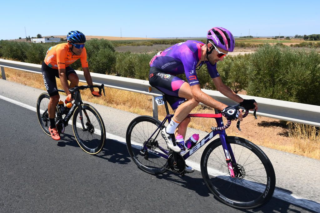 TOMARES SPAIN SEPTEMBER 06 Ander Okamika Bengoetxea of Spain and Team Burgos BH and Luis ngel Mat Mardones of Spain and Team Euskaltel Euskadi compete in the breakaway during the 77th Tour of Spain 2022 Stage 16 a 1894km stage from Sanlcar de Barrameda to Tomares LaVuelta22 WorldTour on September 06 2022 in Tomares Spain Photo by Tim de WaeleGetty Images