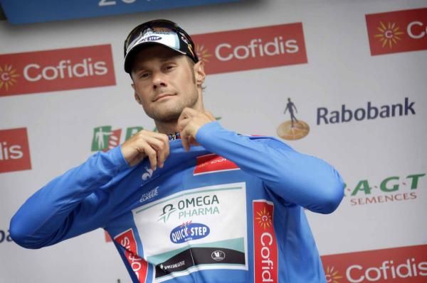 Tom Boonen (Omega Pharma-QuickStep) in the leader's jersey.