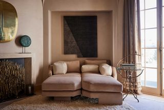 lime was terracotta walls with pink sofa and dark blue artwork