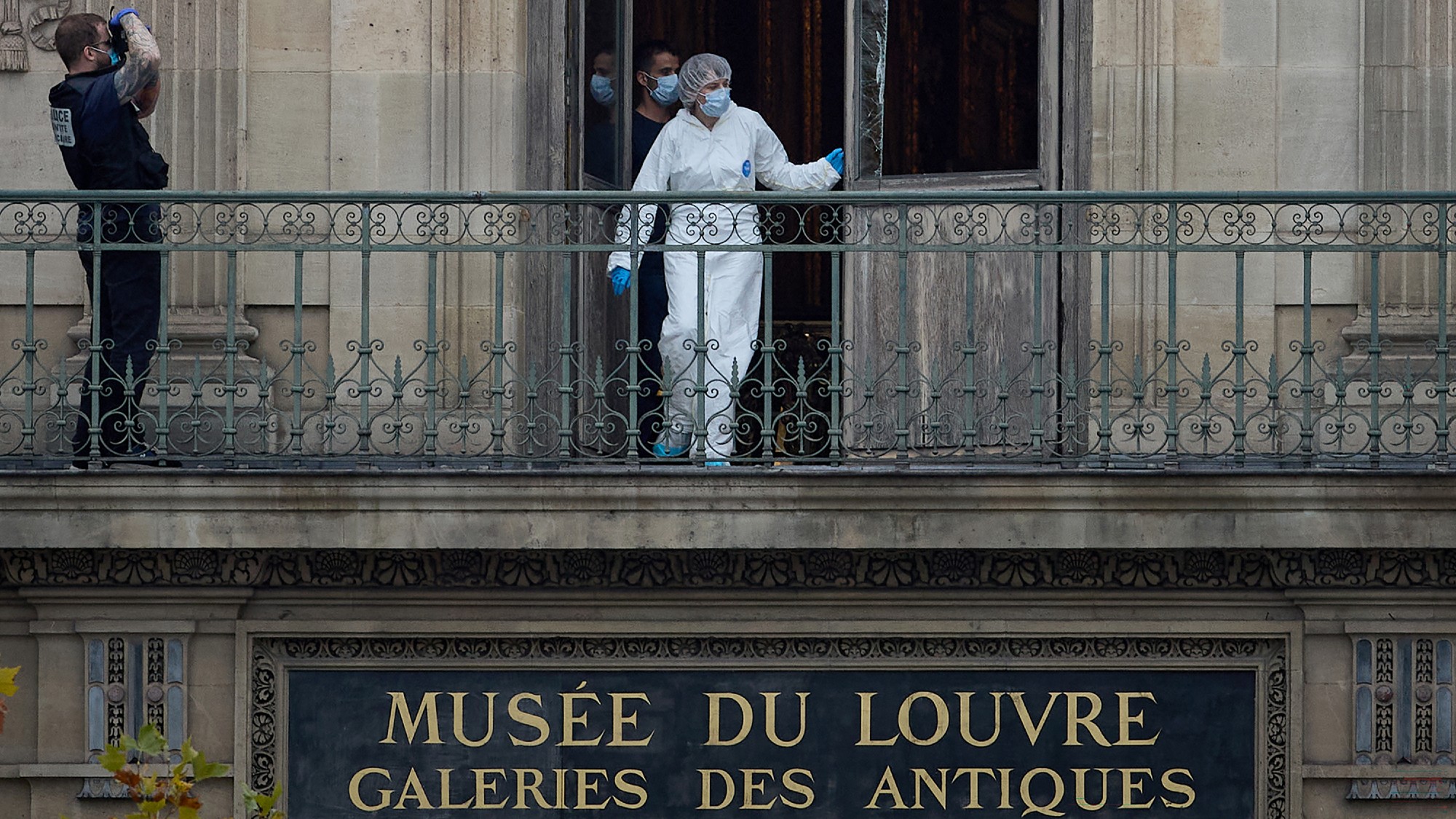 Investigators at the Louvre