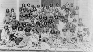 Ciricahua Apache children, photographed upon their arrival at the Carlisle Indian School in Carlisle, Pennsylvania, in the 1880s. This was the first government-run boarding school for Native American children in the U.S., operating from 1879 to 1918.