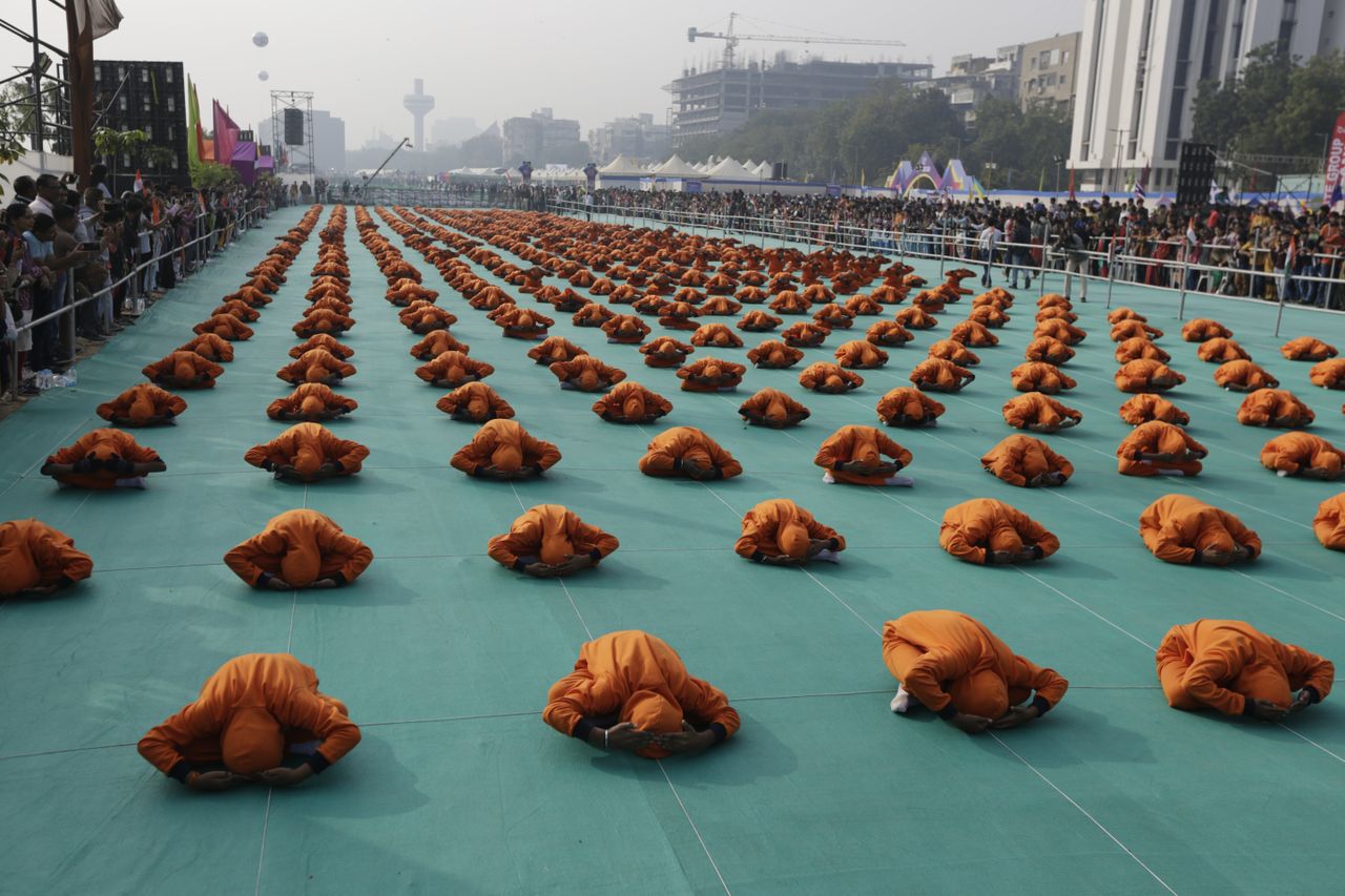 Children doing yoga.