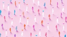 A CGI representation of AI agents, shown as semi-transparent people stood in a giant crowd of colorful silhouettes, shot from above on a pink background.