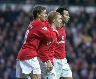 Paul Scholes, centre, and Ole Gunnar Solskjaer, left, were long-time team-mates at Old Trafford