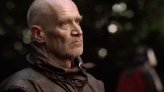 A close up of Wilko Johnson as Ser Ilyn Payne, looking very serious, in Game Of Thrones