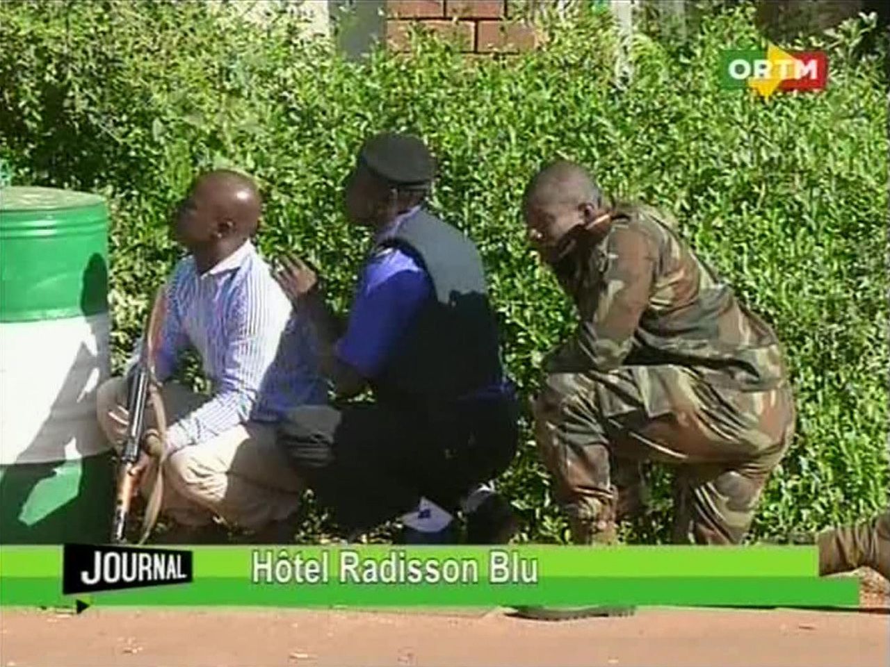 Security forces converge outside the Bamako hotel.