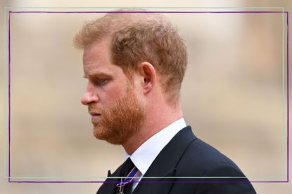 Prince Harry, Duke of Sussex as he joined the Procession following the State Hearse carrying the coffin of Queen Elizabeth II towards St George's Chapel on September 19, 2022 in Windsor, England. 