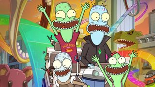 colorful cartoon aliens scream in glee as they ride a roller coaster