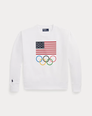 a flag sweater from the olympic games designed by ralph lauren in front of a plain backdrop