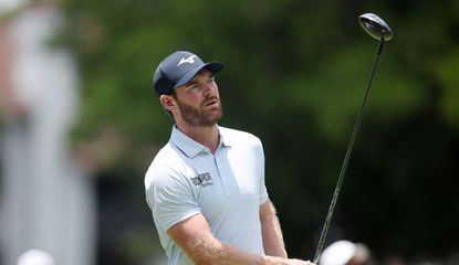 Grayson Murray hits a driver and watches its flight