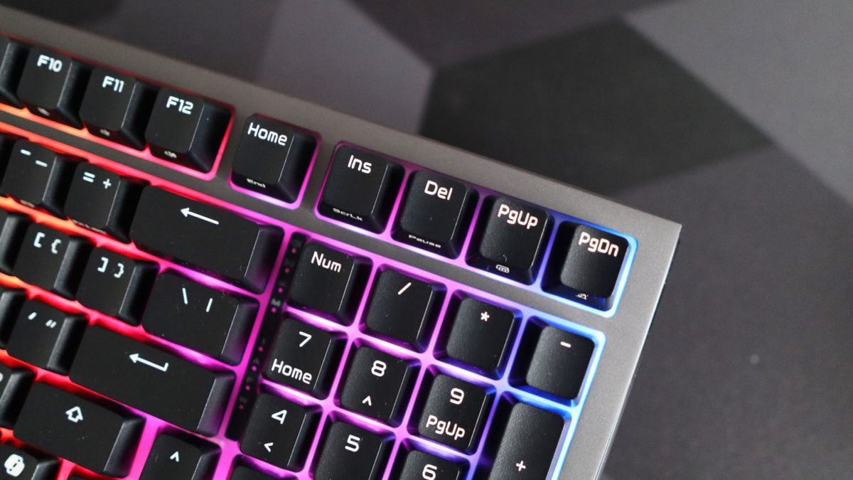 Asus ROG Strix Morph 96 Wireless on a desk mat.