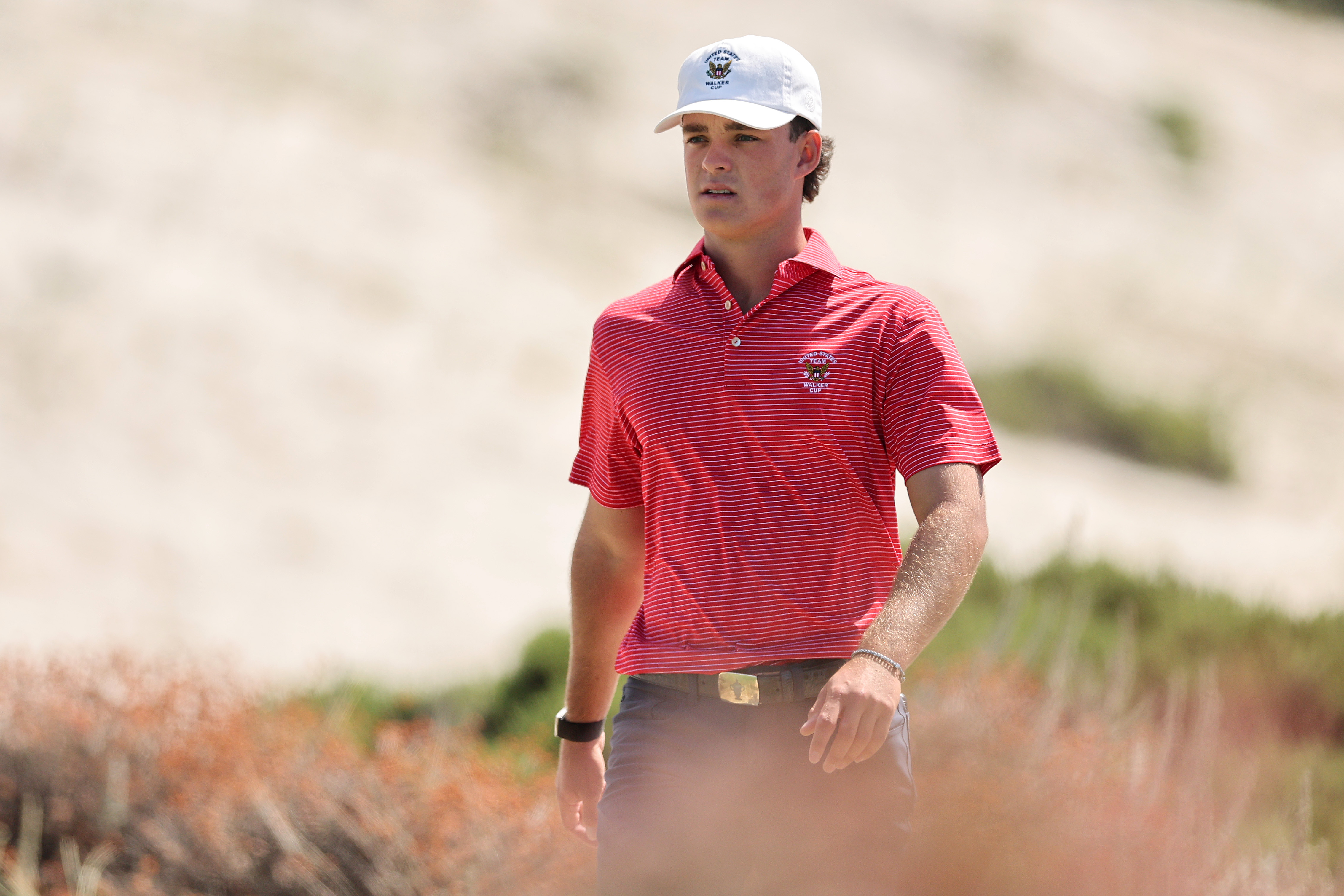 Jackson Koivun walks down the fairway