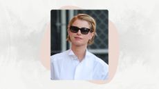 Jessie Buckley is seen on January 15, 2026 in Los Angeles, California, with a pixie cut hairstyle and wearing black sunglasses and a white shirt.