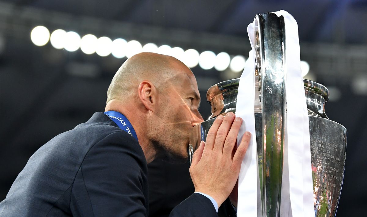 Real Madrid manager Zinedine Zidane kisses the Champions League trophy following his side's victory over Liverpool in the 2018 final at the Olympic Stadium in Kyiv, Ukraine