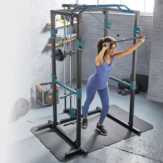 room with grey floor and multipurpose power rack