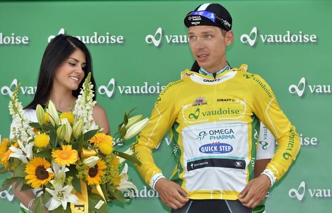 Tony Martin (Omega Pharma-QuickStep) puts on the yellow leader's jersey for a third day in a row