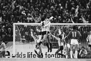 Argentina players celebrate as Leopoldo Luque makes it 4-0 against Peru in a game at the 1978 World Cup.