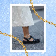 woman wearing fisherman sandals and an ankle bracelt