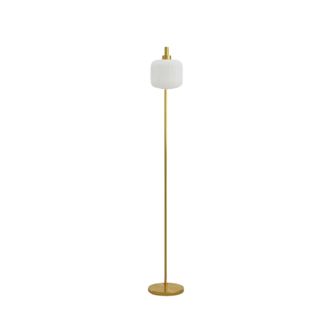 A gold floor lamp with a white lampshade