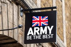 A black British Army sign hanging outside one of its recruitment centres