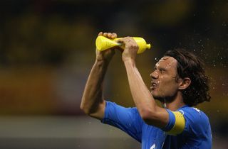 Paolo Maldini cools off during Italy's match against Ecuador at the 2002 World Cup.
