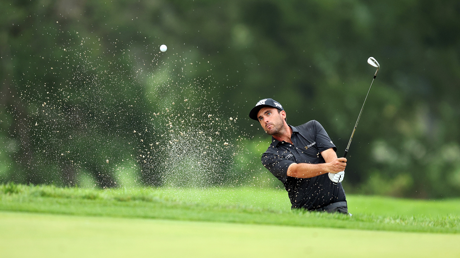 Ryan McCormick hits a bunker shot