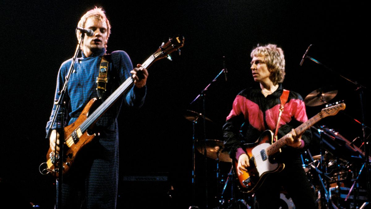 Photo of POLICE and STING and Andy SUMMERS, Sting and Andy Summers performing on stage