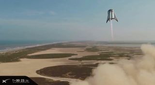 SpaceX's Starhopper prototype soars above Boca Chica, Texas, during its final test flight on Aug. 27, 2019