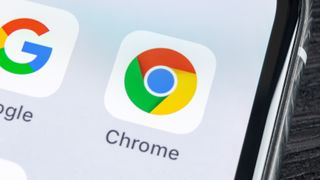 An image of the Google Chrome logo on a smartphone