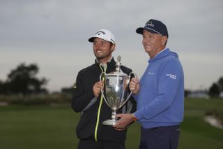 Svensson and Love III hold the trophy