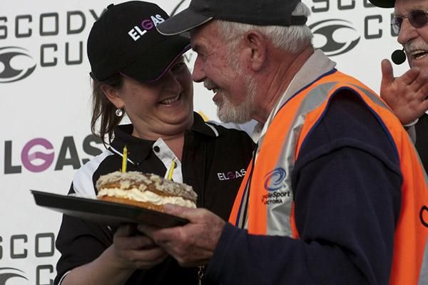Popular race official, Graham Bull, joined in the celebrations when he was presented with a cake for his 67th birthday.