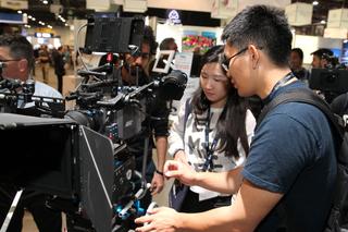 Attendees check out the latest imaging technology at the ARRI booth. 