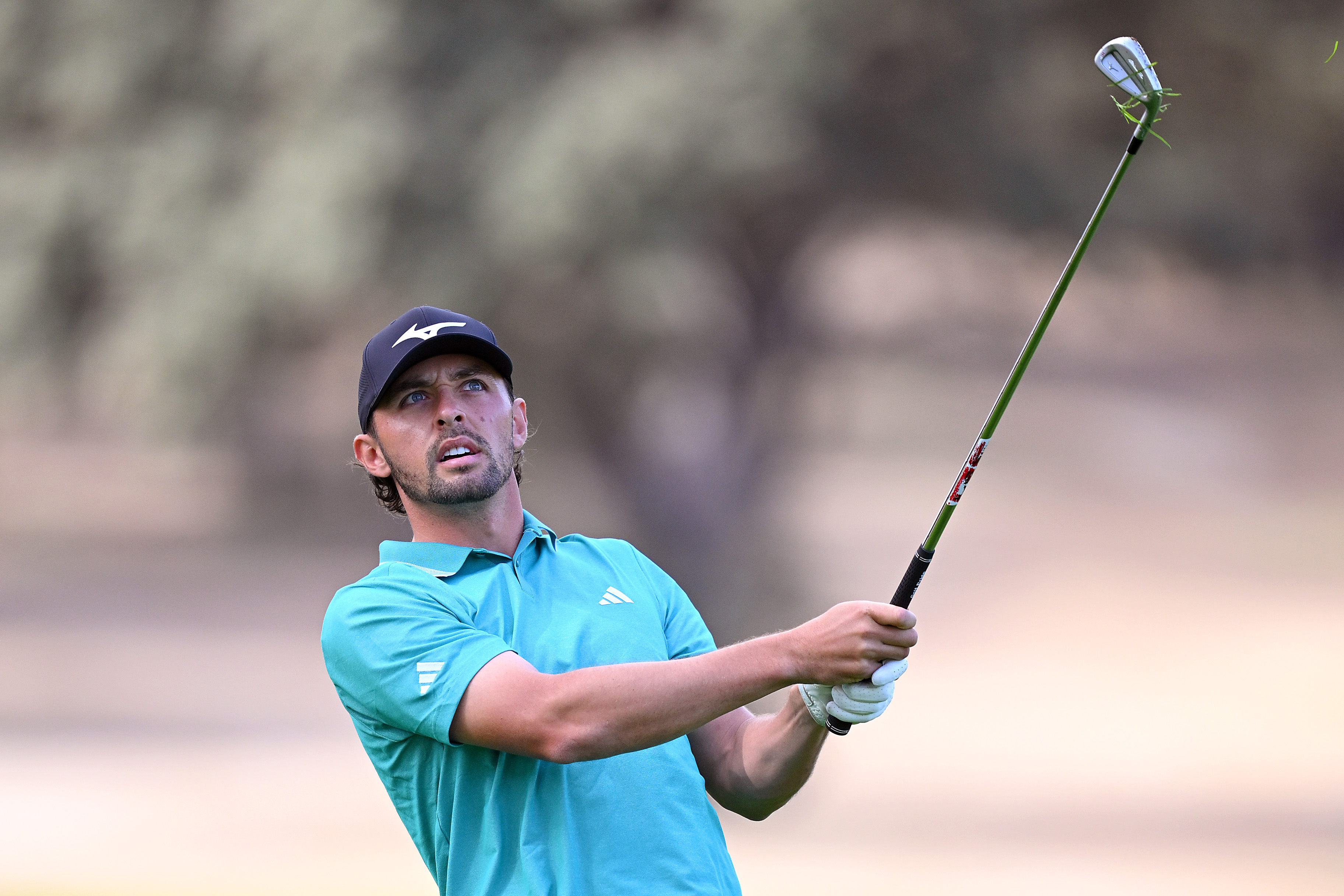 Marco Penge hits an iron shot