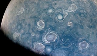 Powerful storms around the north pole of Jupiter captured by NASA's Juno mission during a recent flyby.