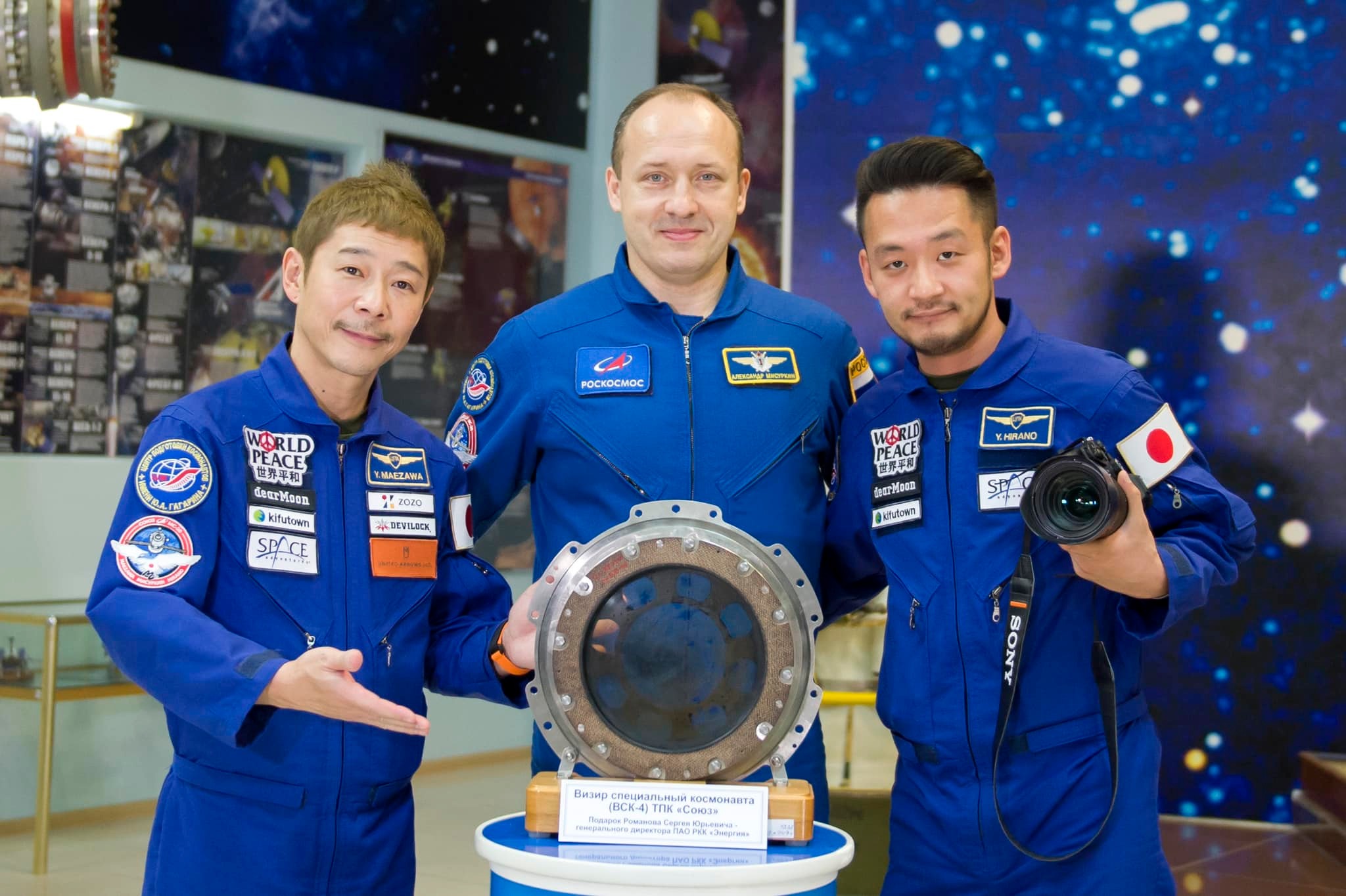 Billionaire entrepreneur Yusaku Maezawa (left), cosmonaut Alexander Misurkin (center) and video producer Yozo Hirano (right) are scheduled to launch toward the International Space Station on Dec. 8, 2021. Hirano will participate in health-related research during and after the mission.