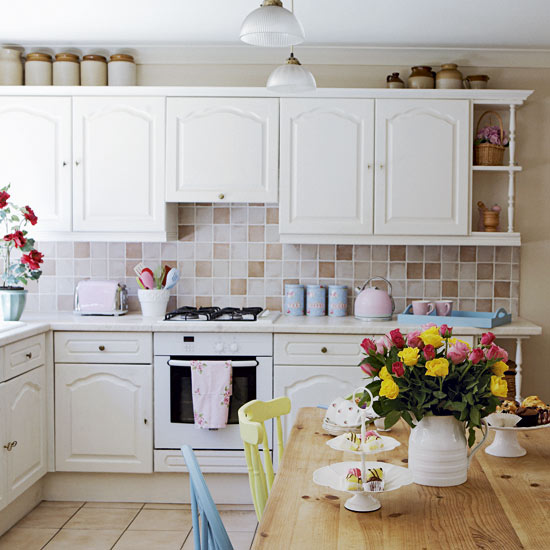 kitchen with dinning table and cabinets