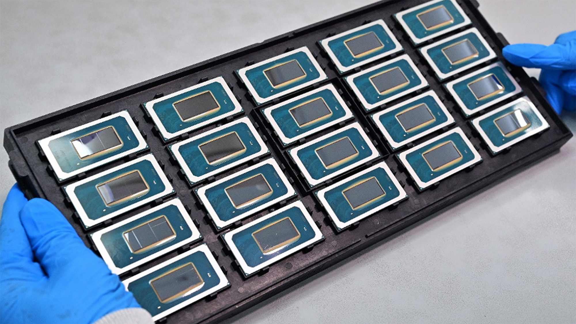 A palette of Intel Core Ultra CPUs in a tray